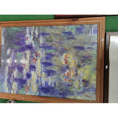 510 - A collection of three prints framed and glazed including Monet 