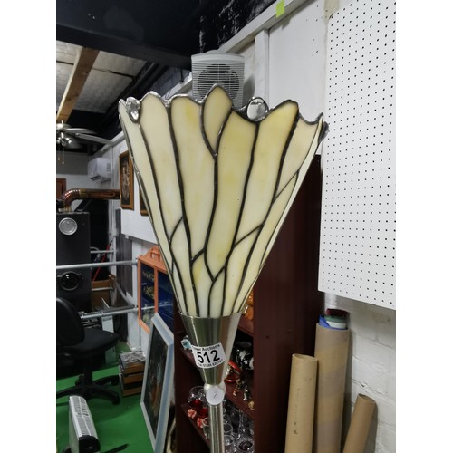 512 - A leaded glass standard lamp, lily esque design. On a chrome base, in working order.
Height 182cm.