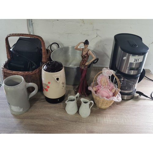 261 - A quantity of collectables including a coffee machine, a tall lady figurine, a pair of Portmeirion P... 