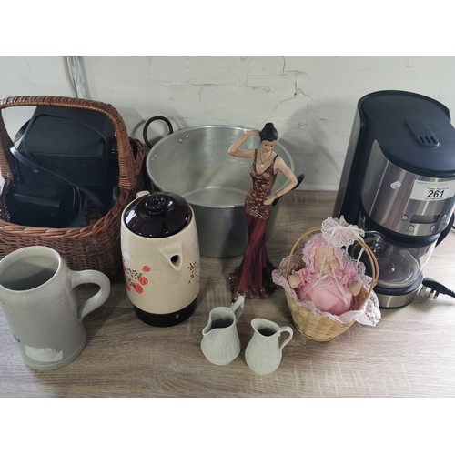 261 - A quantity of collectables including a coffee machine, a tall lady figurine, a pair of Portmeirion P... 