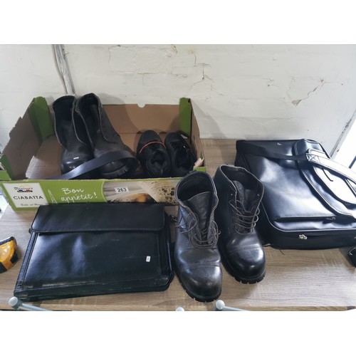 263 - A quantity of leather items including an antler laptop bag, work satchel bag, 2 pairs of size 10 hob... 