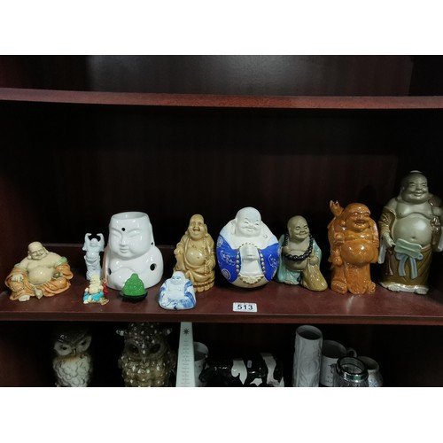 513 - A quantity of Buddhas of varying sizes including a tealight Buddha, a jade Buddha on stand, resins B... 