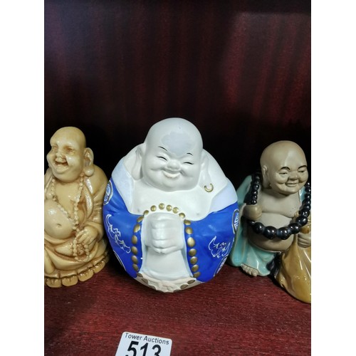 513 - A quantity of Buddhas of varying sizes including a tealight Buddha, a jade Buddha on stand, resins B... 