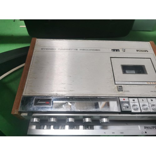 521 - A Philips three deck system including amplifier, cassette player and record deck. Complete with cabl... 