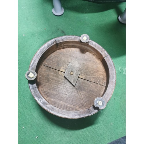 528 - A circular leatherette Ikea footstool along with an antique inlaid wood footstool with bun feet.