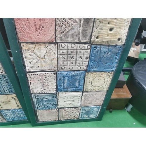 529 - Three wooden panels of naive tile art, each panel containing eighteen handmade, hand decorated tiles... 