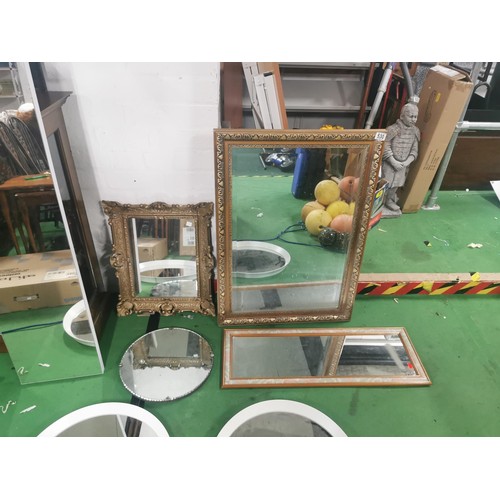 530 - A collection of seven mirrors, one with an ornate frame. Including an antique circular mirror with c... 