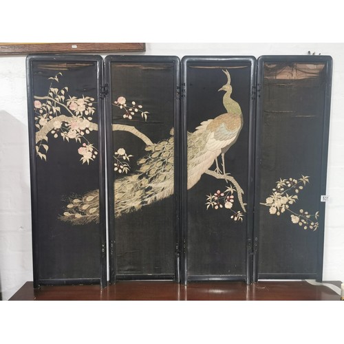 531 - An antique Asian ebonised 4 fold double sided embroidered silk screen. One side decorated with a pea... 