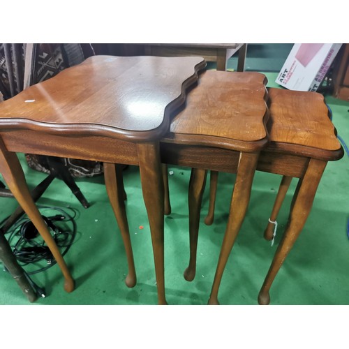 535 - Cherry-wood three tier nest of tables.