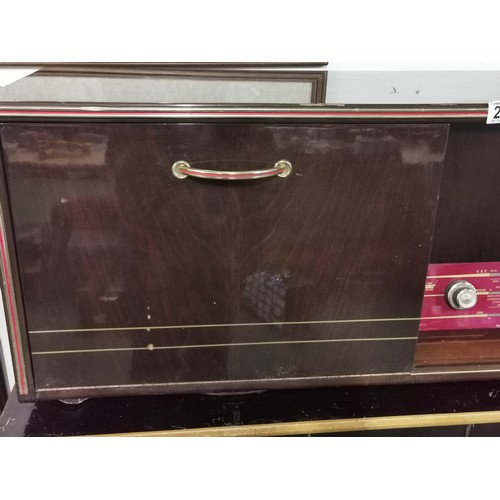 291 - A vintage tabletop radiogram by Stella, stereo version. Long, medium and VHF along with a Philip's t... 