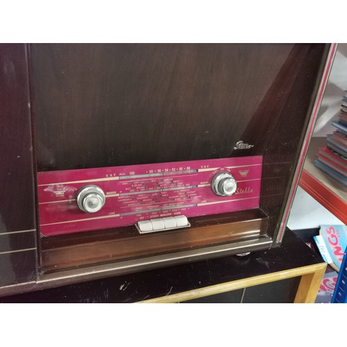 291 - A vintage tabletop radiogram by Stella, stereo version. Long, medium and VHF along with a Philip's t... 