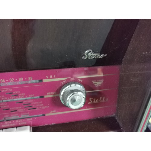 291 - A vintage tabletop radiogram by Stella, stereo version. Long, medium and VHF along with a Philip's t... 