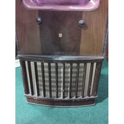 293 - An early vintage Alba television. doors at the front and speaker at the base. Comes with the rare pi... 