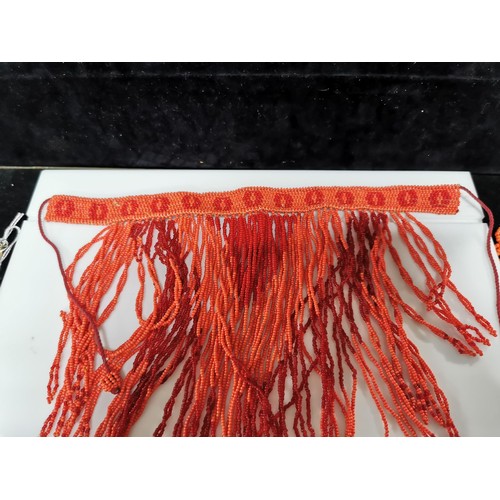 483 - 2x large African genuine coral beaded necklaces along with a rope necklace which has a large chunk o... 