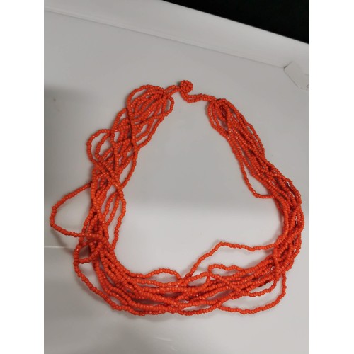 483 - 2x large African genuine coral beaded necklaces along with a rope necklace which has a large chunk o... 