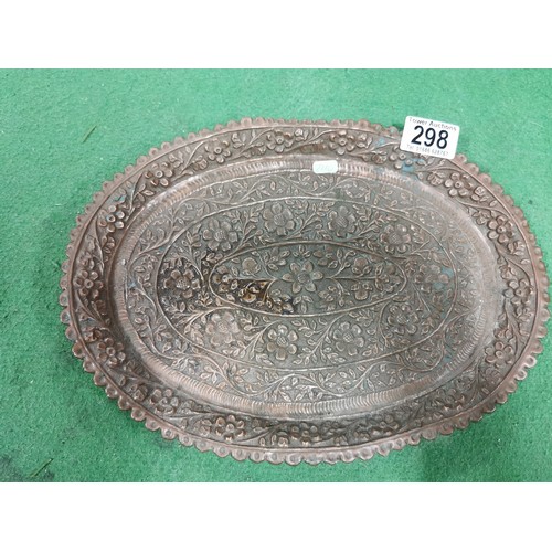 298 - An antique ornate floral design handmade copper tray.
Length 31cm Width 22cm.