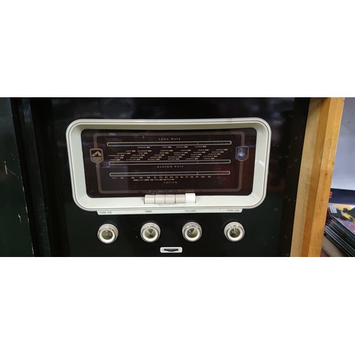 292 - A His Masters Voice (HMV) radiogram. Pull push amplifier, stereo unit, long wave, medium wave, VHF F... 