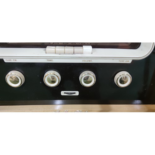 292 - A His Masters Voice (HMV) radiogram. Pull push amplifier, stereo unit, long wave, medium wave, VHF F... 