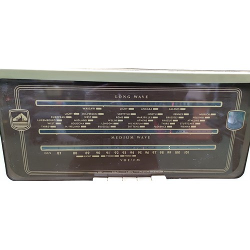 292 - A His Masters Voice (HMV) radiogram. Pull push amplifier, stereo unit, long wave, medium wave, VHF F... 