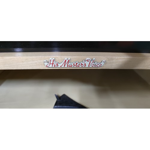 292 - A His Masters Voice (HMV) radiogram. Pull push amplifier, stereo unit, long wave, medium wave, VHF F... 