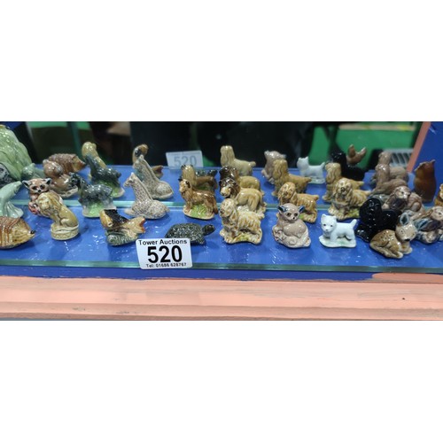 520 - A very large collection of Wade Whimsies including alligator, beavers, squirrels, giraffe, Scottie d... 