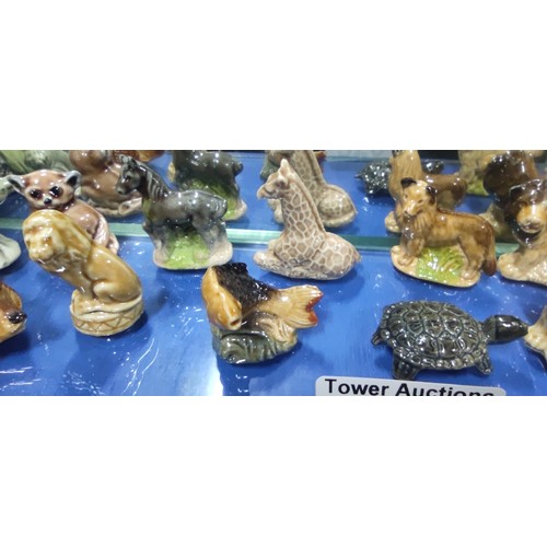 520 - A very large collection of Wade Whimsies including alligator, beavers, squirrels, giraffe, Scottie d... 
