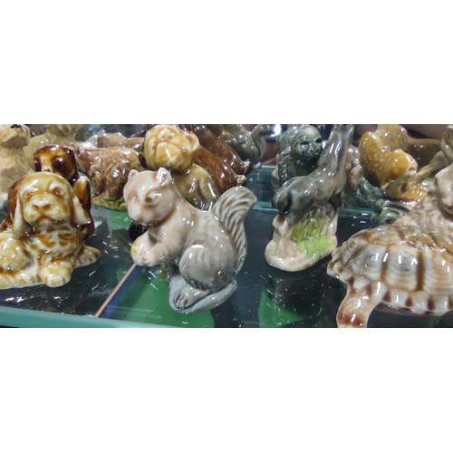 520 - A very large collection of Wade Whimsies including alligator, beavers, squirrels, giraffe, Scottie d... 