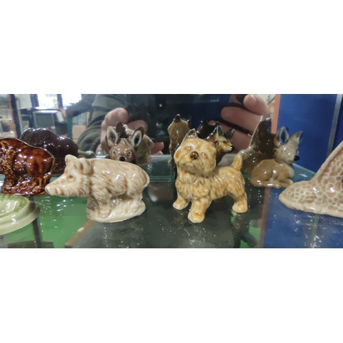 520 - A very large collection of Wade Whimsies including alligator, beavers, squirrels, giraffe, Scottie d... 