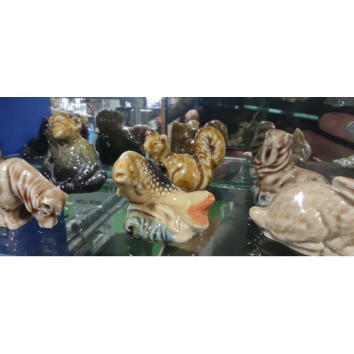 520 - A very large collection of Wade Whimsies including alligator, beavers, squirrels, giraffe, Scottie d... 
