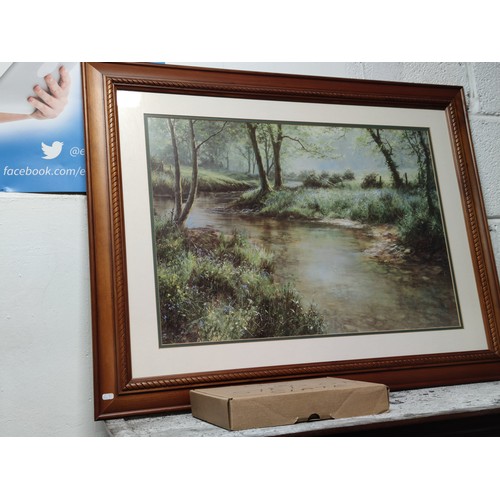 497A - Large framed and glazed print of a river scene signed bottom right, 64cm high, 82cm long