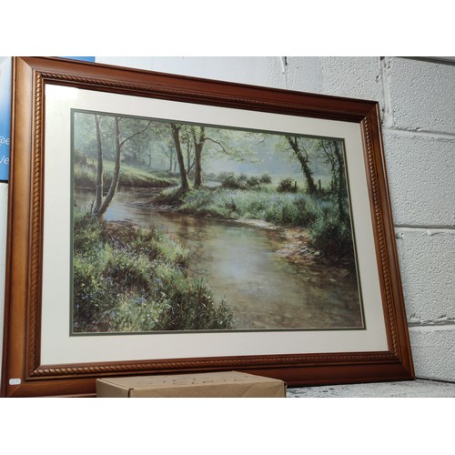 497A - Large framed and glazed print of a river scene signed bottom right, 64cm high, 82cm long