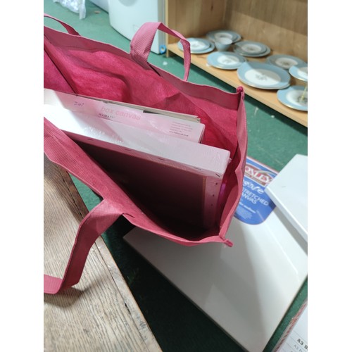 534 - A large quantity of artists equipment including , a quantity of stretched canvases, drawing board et... 
