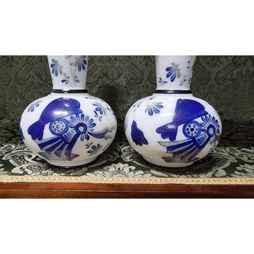 496 - A pair of milk glass hand painting vases with floral design with signature to the base in excellent ... 