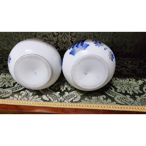 496 - A pair of milk glass hand painting vases with floral design with signature to the base in excellent ... 