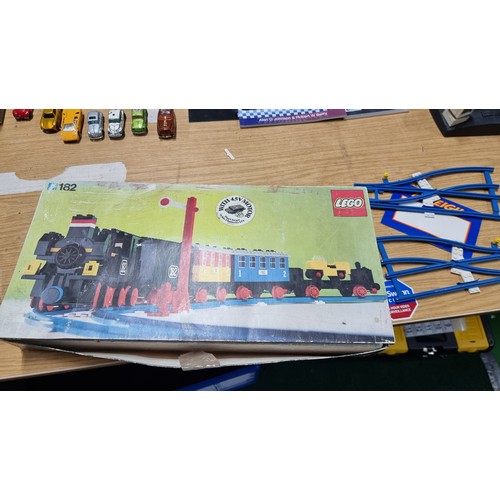 30A - Vintage boxed Lego 182 train set with all the carriages and locomotive, loco needs reasembelling app... 