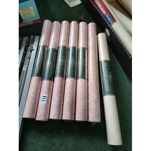 114 - A selection of sealed Laura Ashley wallpaper. 6 in pink with floral design along with 3 rolls of Ana... 