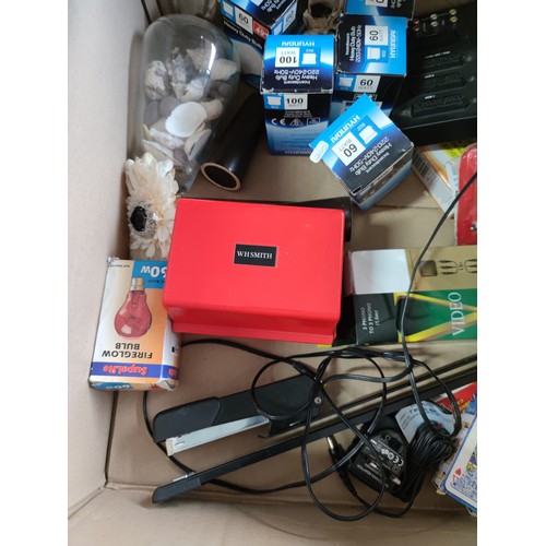 119 - A box containing a quantity of electrical items, including scart lead interface, along with a quanti... 