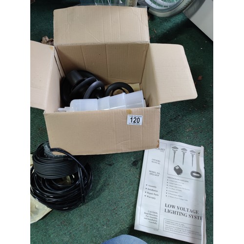 120 - A boxed twilight range garden lighting set. Complete with cables, lamps etc.