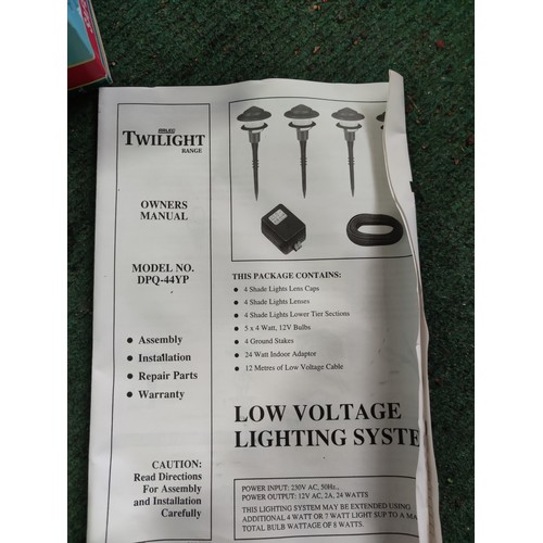 120 - A boxed twilight range garden lighting set. Complete with cables, lamps etc.