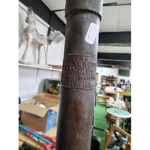 13 - A part of a oil pump by the Rosebery Oil Pump Earnest H. Hill Ltd Sheffield. Length 94cm