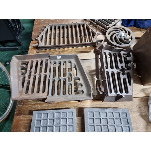 14 - Large quantity of fire grates, set of unused foot plates, 6x fire bricks etc