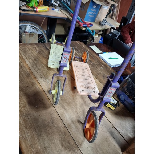 15 - Pair of vintage retro children's scooters by Bantel in a yellow and orange colour way. Both in good ... 