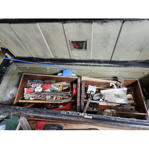 19 - Very large metal tool / storage box containing a comprehensive suite of tools inc saws, hammers, oil... 