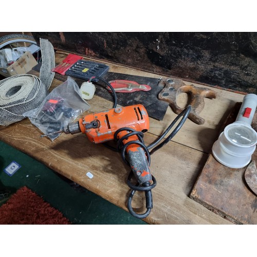 19 - Very large metal tool / storage box containing a comprehensive suite of tools inc saws, hammers, oil... 