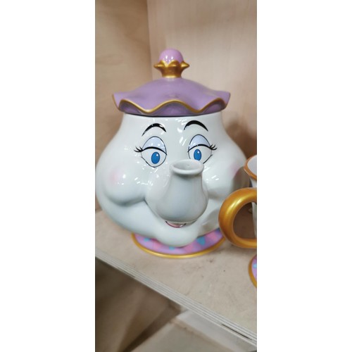 462 - Disney Beauty and The Beast Mrs Potts Teapot & Teacup - both in very good condition. Teapot measures... 