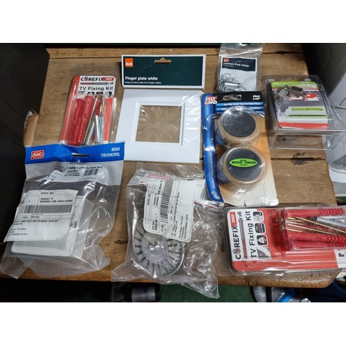 27 - A large job lot in 3x boxes of new and sealed hardware inc various door and draw handles, electrical... 