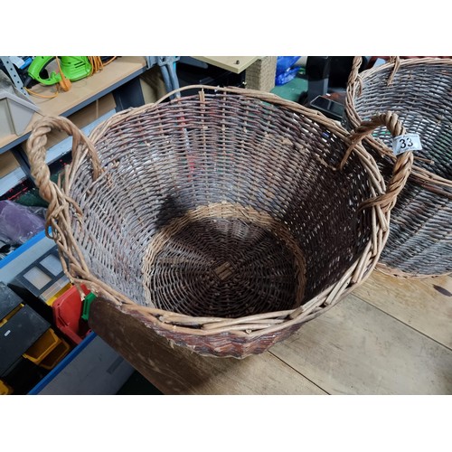 33 - 2x large wicker baskets along with 2x large wicker planters with plastic lining. Height of 35cm x di... 