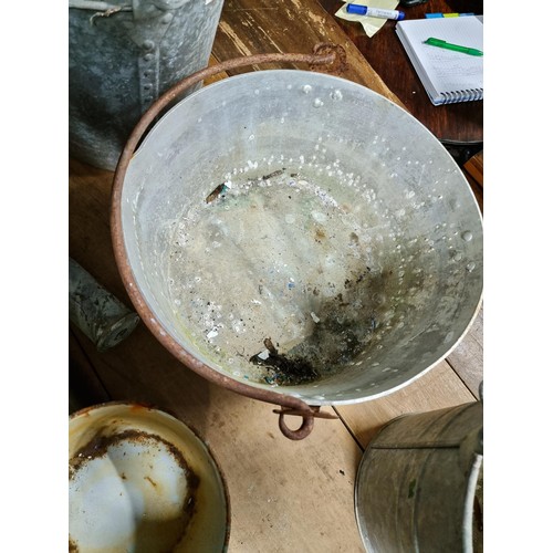 35 - 2x galvanised buckets with no holes along with a large aluminium pan, vintage brass shells, wooden f... 