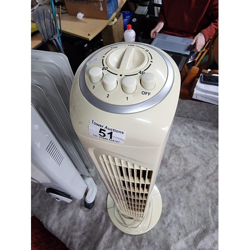 51 - An Igenix oil filled electric radiator along with an Argos tower fan heater