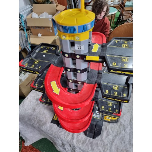 55 - Large children's toy parking station, 6x floors in good condition. Height of 87cm x width 63cm x dep... 